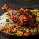 Welcome-&-Our-Food-Small-lcartwork_Red_Tandoori_Chicken_Leg_on_a_plate_of_colourful_basm_9671aecd-569f-4ccf-93b7-09f4f6bdb632 Welcome-&-Our-Food-Small-lcartwork_Red_Tandoori_Chicken_Leg_on_a_plate_of_colourful_basm_9671aecd-569f-4ccf-93b7-09f4f6bdb632